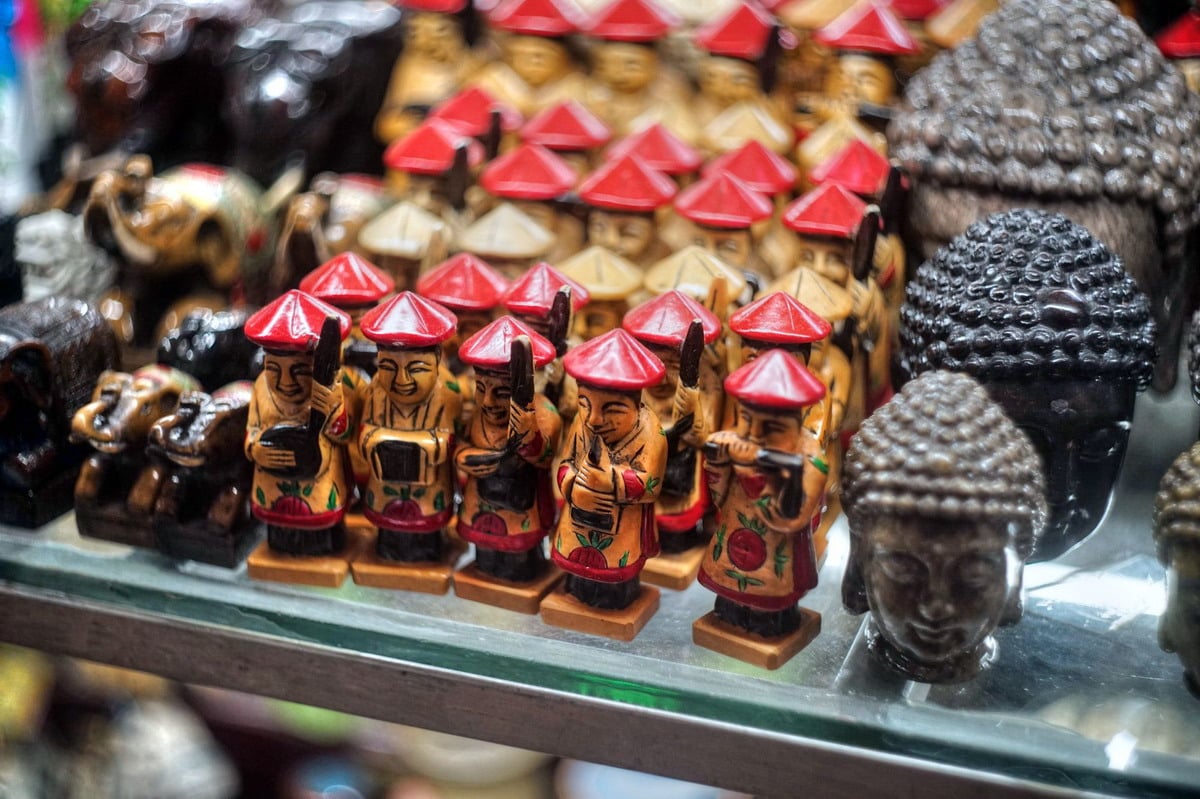 Bargaining with local vendors at Dong Xuan Market Hanoi shopping