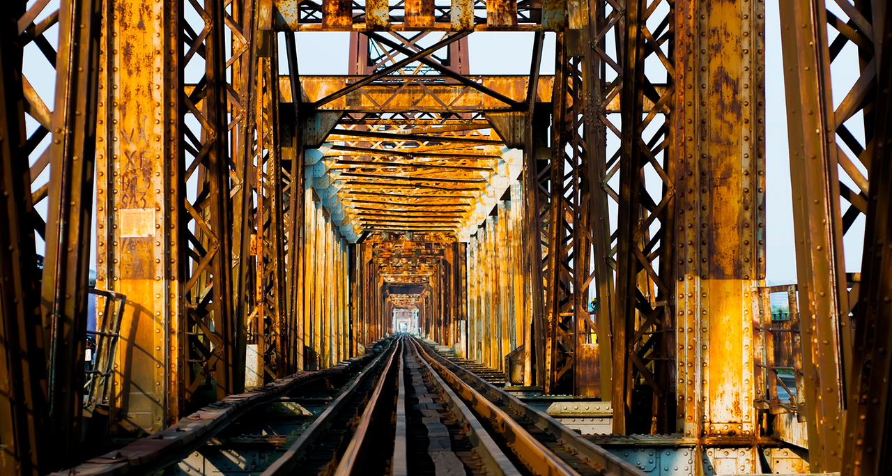 Long Bien Bridge sunset river view near Dong Xuan Market Hanoi Vietnam